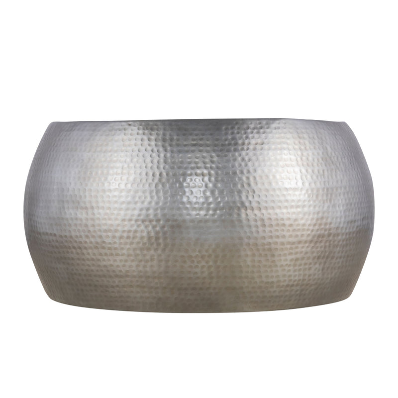 Round ottoman table, hammered light-silver metal drum shape