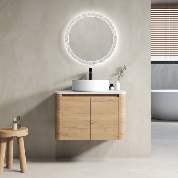 Wall-mounted bathroom vanity with light wood cabinet, white top, and black vessel sink
