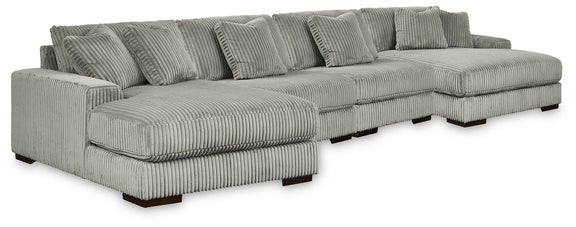 Gray ribbed fabric sectional sofa with chaise; tufted back and multiple seat cushions