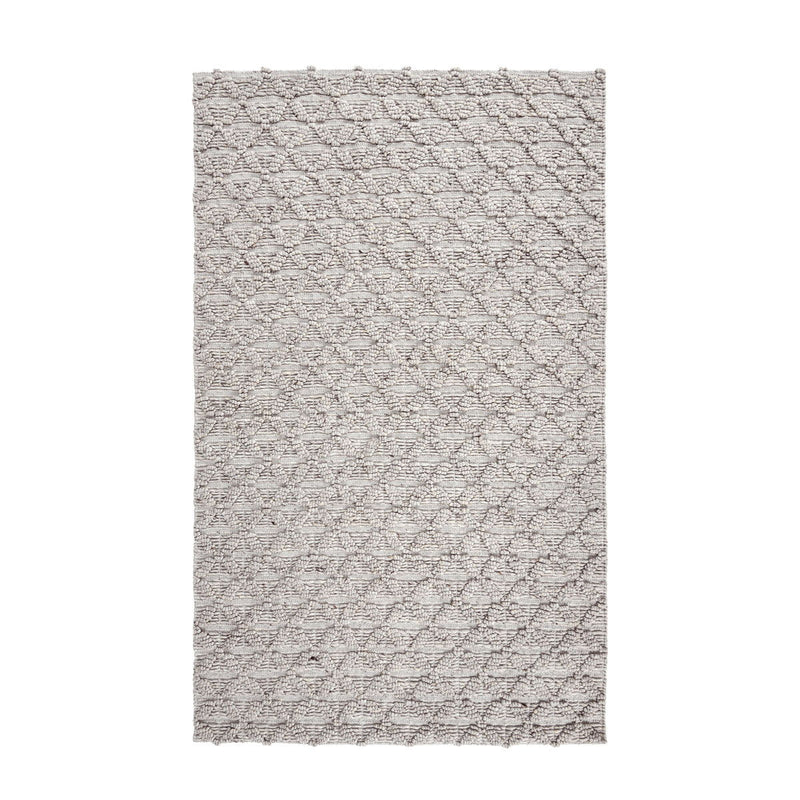 Light gray patterned area rug with textured grid-like motif and short pile.