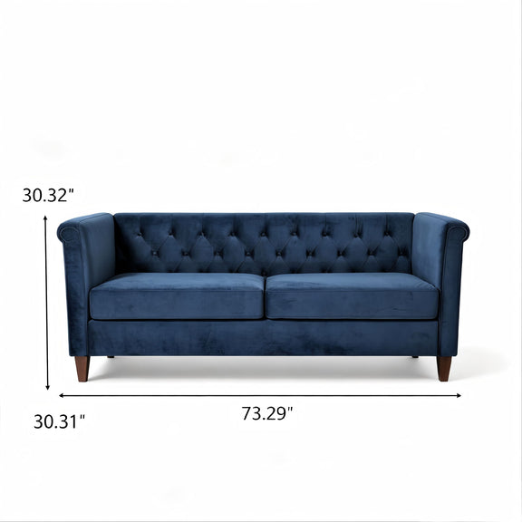 Blue button-tufted 3-seat sofa front view with rolled arms and dark wooden legs