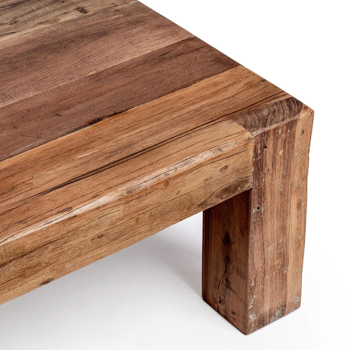 Distressed wood table end with plank texture and thick squared edge