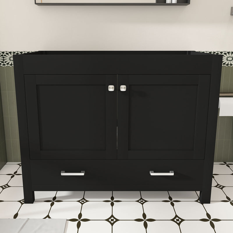 Black bathroom vanity cabinet with double doors and two drawers, sleek bar handles
