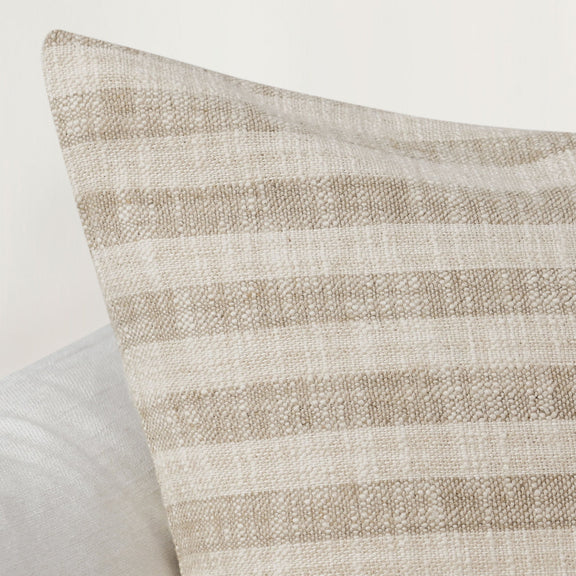Villa Classics Linna pillow close-up, ivory horizontal stripes and textured fabric
