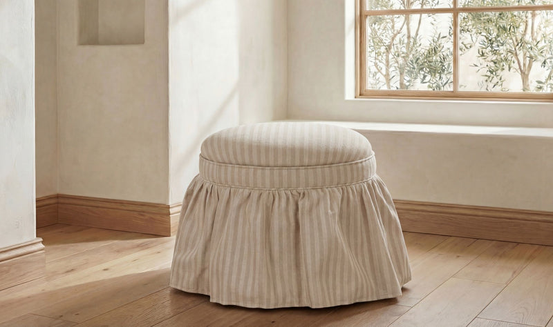 Beige striped round storage ottoman with gathered fabric base