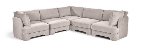 Gray velvet corner sectional sofa with five-piece modular L-shape and cushioned arms