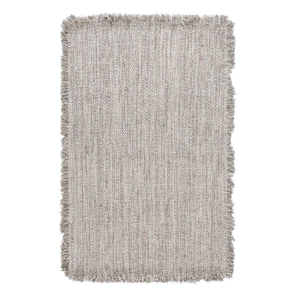 Light beige wool rug with short fringe, rectangular woven texture.