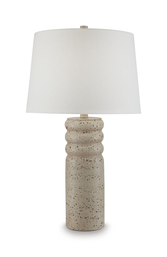 Beige speckled poly table lamp with white drum shade, cylindrical base