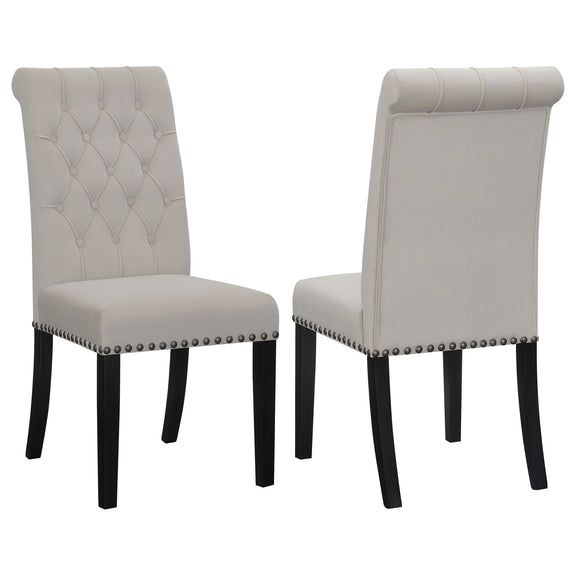Set of 2 tufted rolled backrest side chairs in gray and beige with nailhead trim