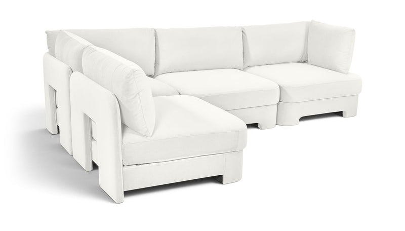 Armless velvet performance fabric sectional, white 4-piece corner setup with plush cushions.