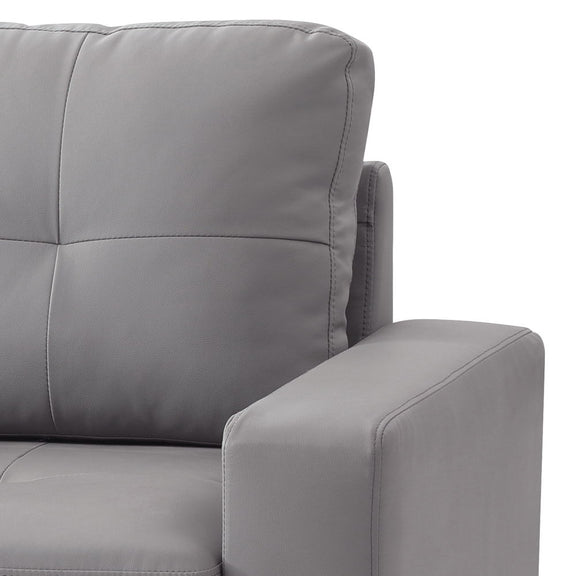 Light gray upholstered accent chair close-up of high back cushion and armrest