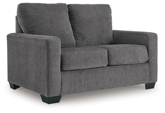 Dark gray fabric loveseat sofa with three seat cushions and tall backrests