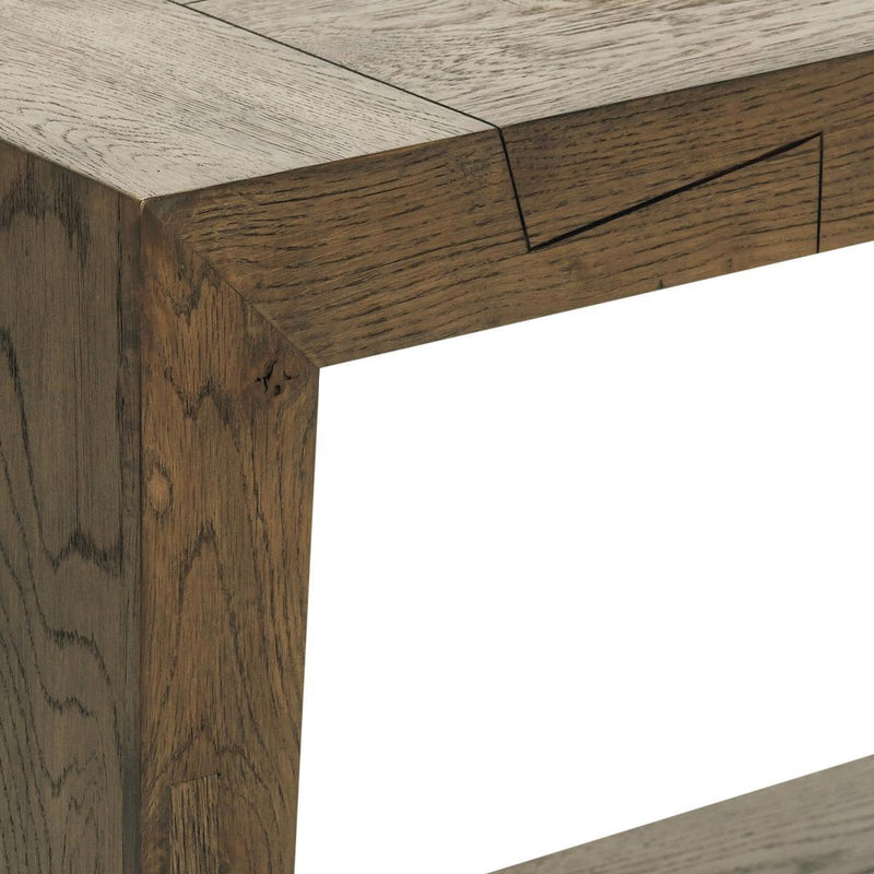 Brown wooden console table corner detail with visible join and grain