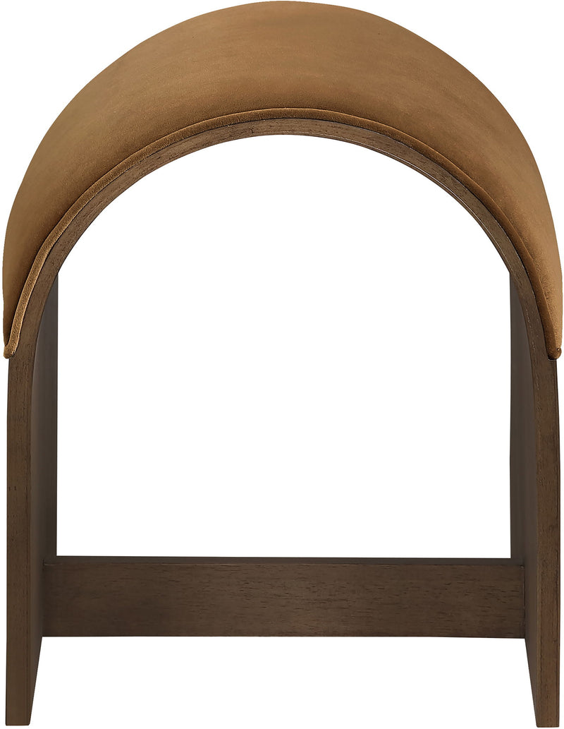 Brown velvet arched upholstered bench with open front cutout