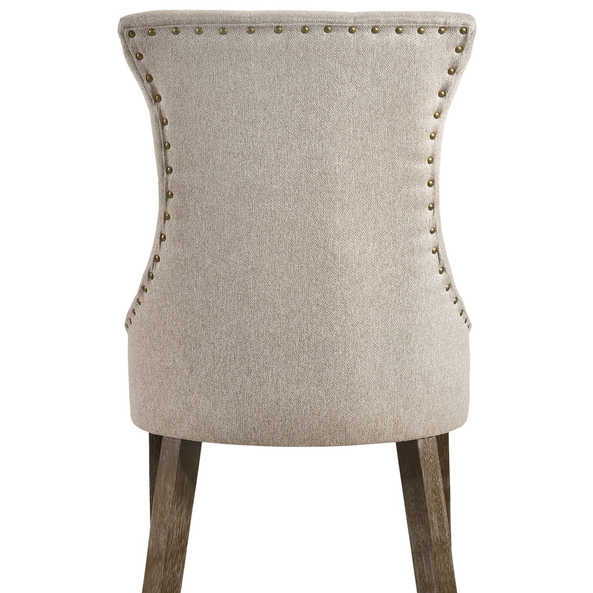 Upholstered side chair back in beige fabric, nailhead trim, dark wood legs