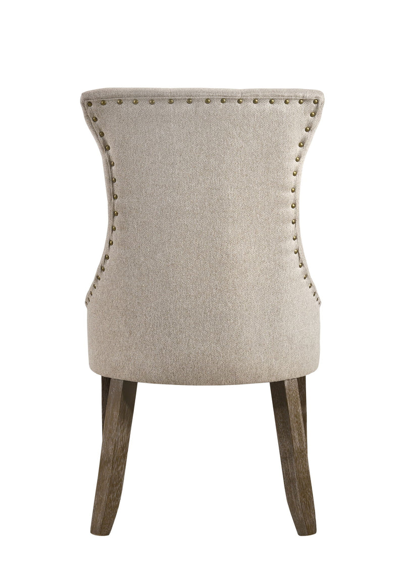 Upholstered side chair back in beige fabric, nailhead trim, dark wood legs
