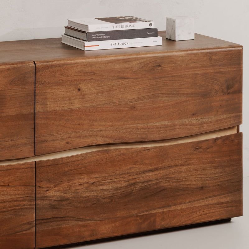 Brown wood 4-drawer dresser with smooth front panels and recessed handles