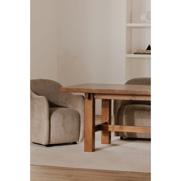 Beige fabric rolling dining chair with wide seat, low back, and casters