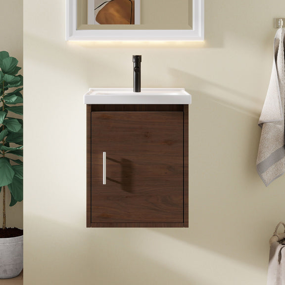 Wall-mounted bathroom vanity cabinet with ceramic sink, dark brown door and white countertop