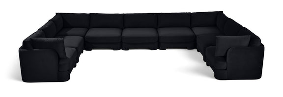 Black velvet modular sectional, 9-piece set with wide chaise and corner arms.