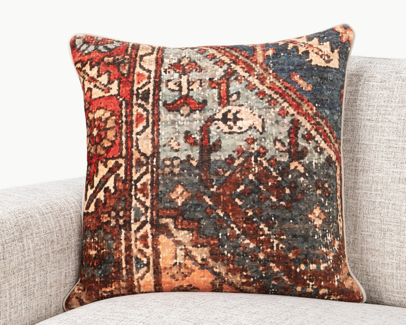Decorative 22" square pillow with multicolor patterned front on textured fabric