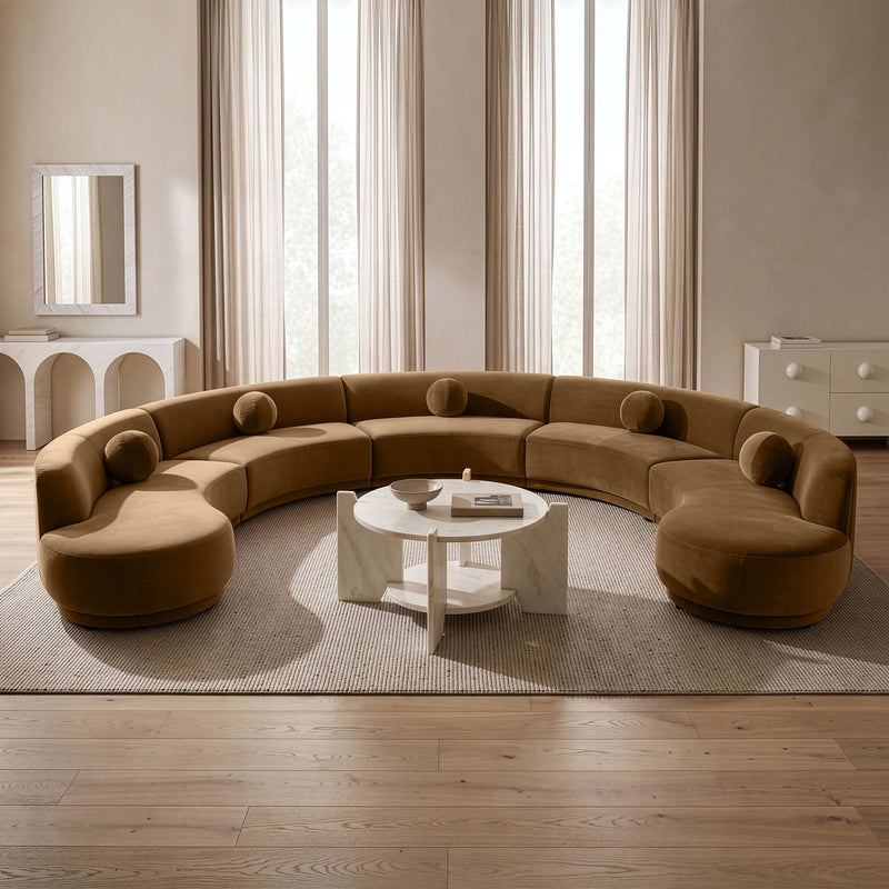 Beige performance velvet sectional sofa with circular seating layout and rounded bolsters