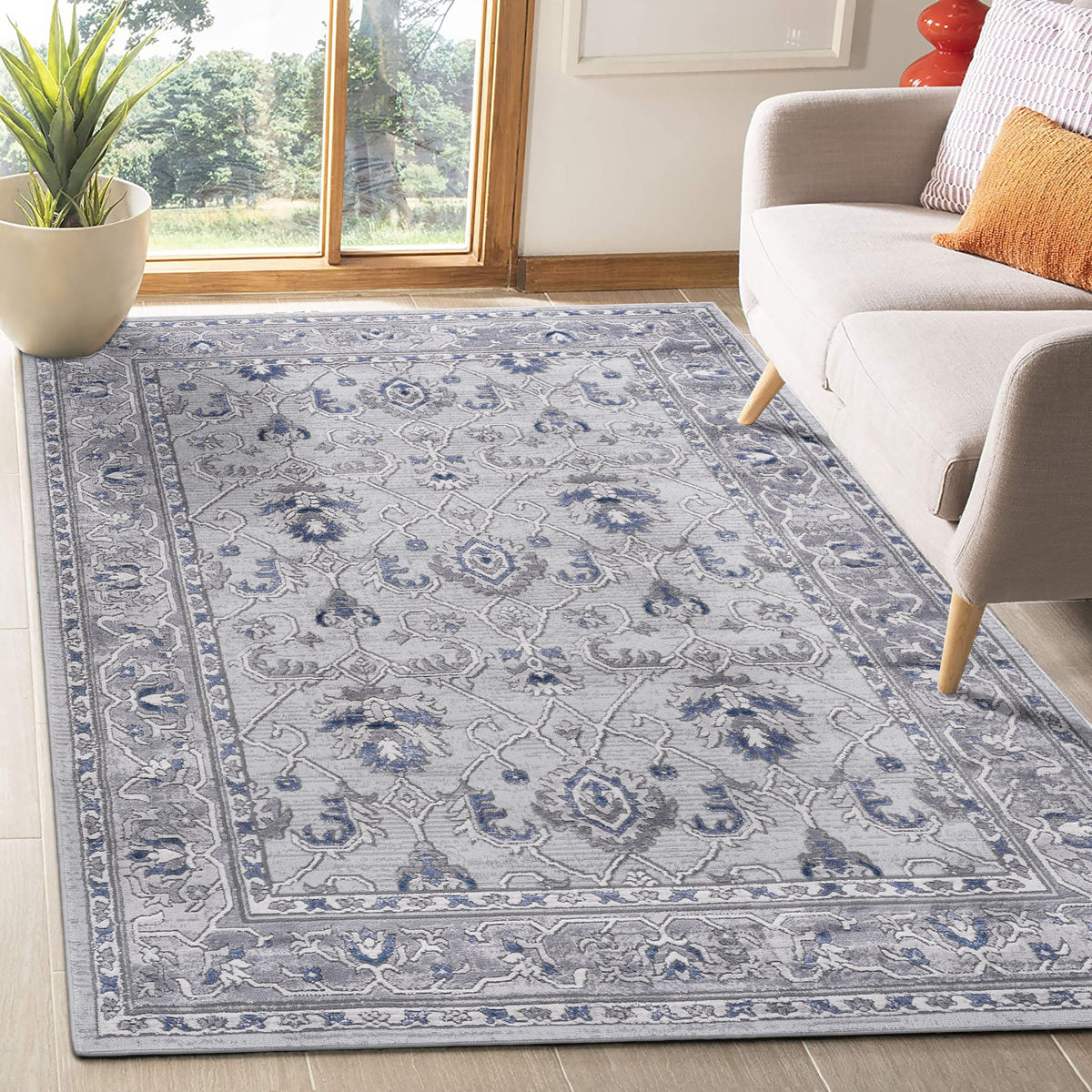 Marfi oriental rug in blue and gray with ornate scrolling pattern, rectangular