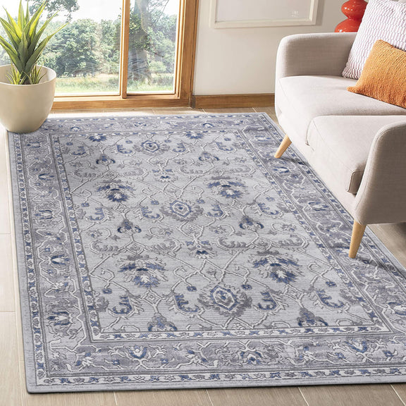 Marfi oriental rug in blue and gray with ornate scrolling pattern, rectangular
