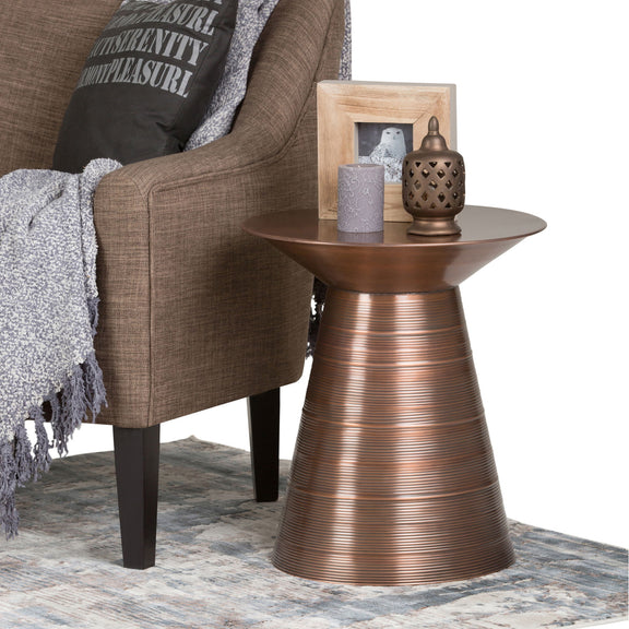 Bronze round metal accent table with fluted pedestal base and wide top
