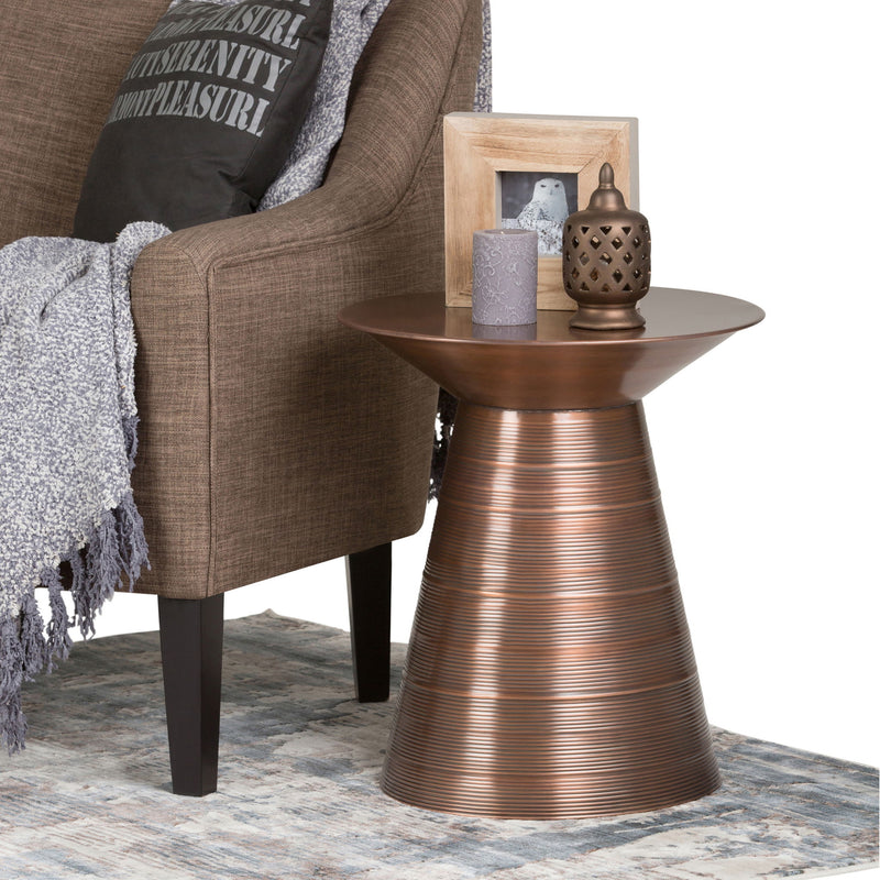 Bronze round metal accent table with fluted pedestal base and wide top