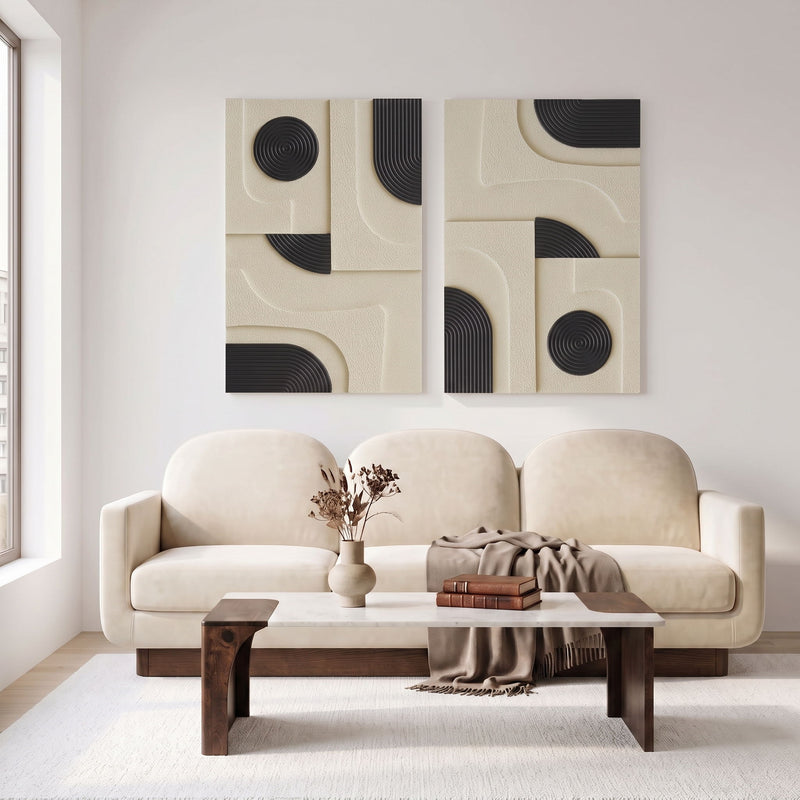 Two-piece wall art set with cream and black textured panels plus light wood spiral accents
