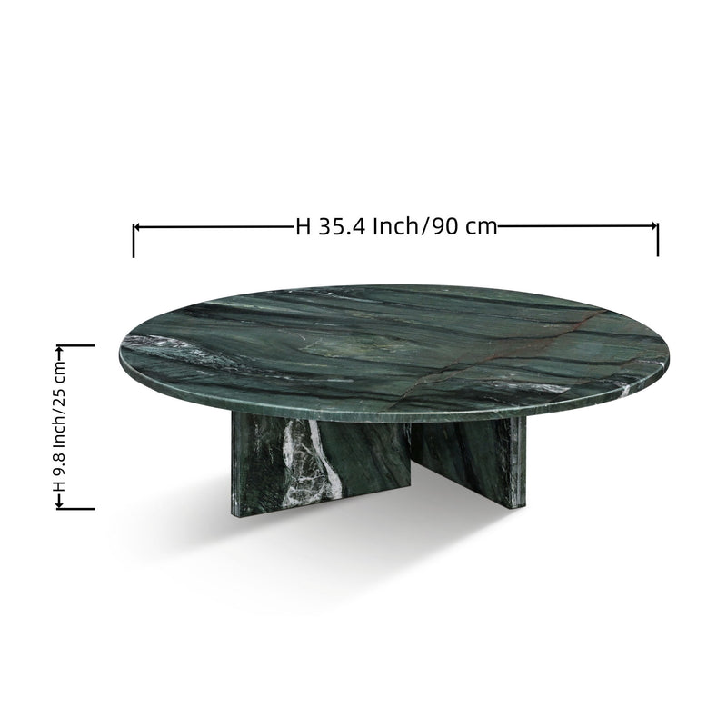 Round dark green marble coffee table with white veining and thick low base