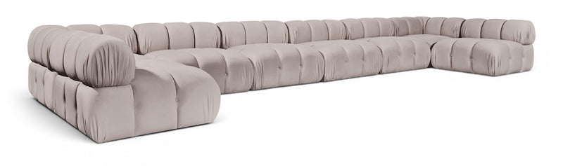 Light gray modular sectional sofa, chaise and corner modules shown