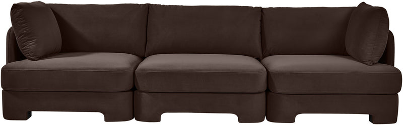 Dark brown velvet 3-piece sofa with three seat sections and low exposed feet