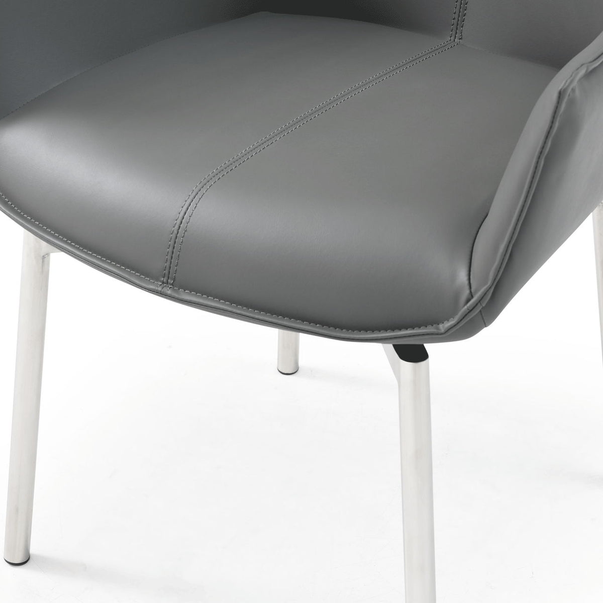 Dark gray dining chair seat with stitched upholstery and white metal legs