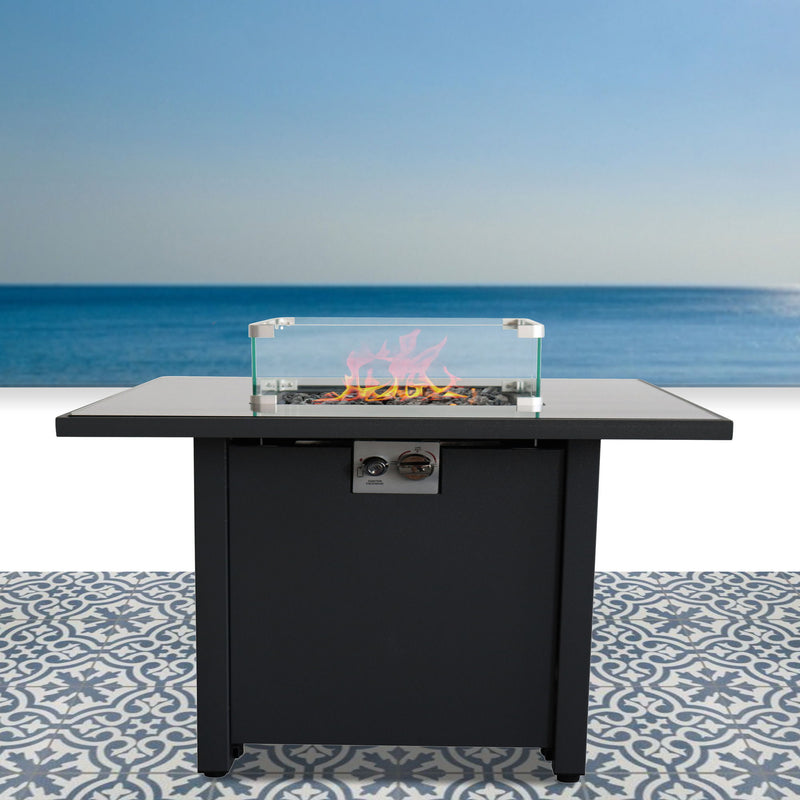 Black fire pit table with clear glass wind guard and front control panel