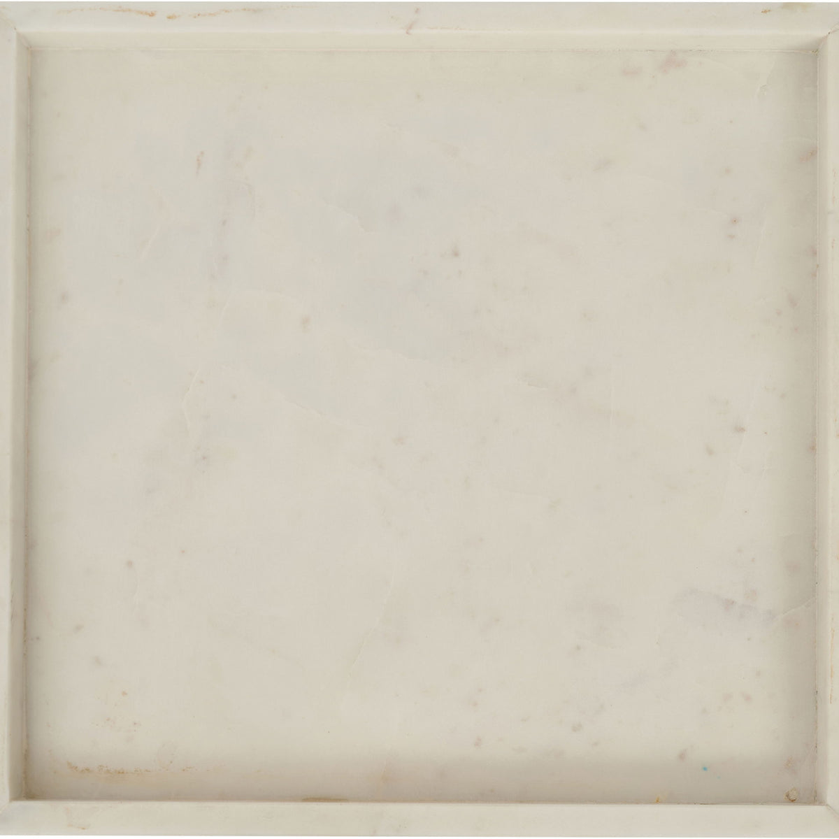 Beige marble tray with squared edges and raised rim