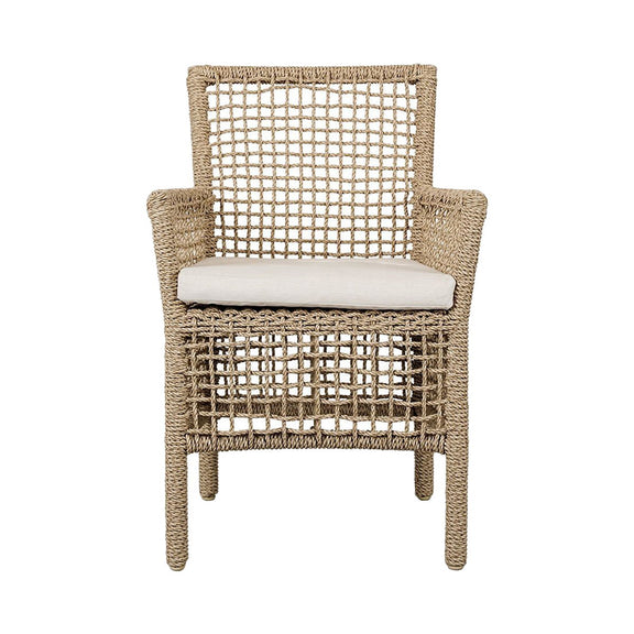 Natural woven outdoor dining chair with white seat cushion and open lattice front