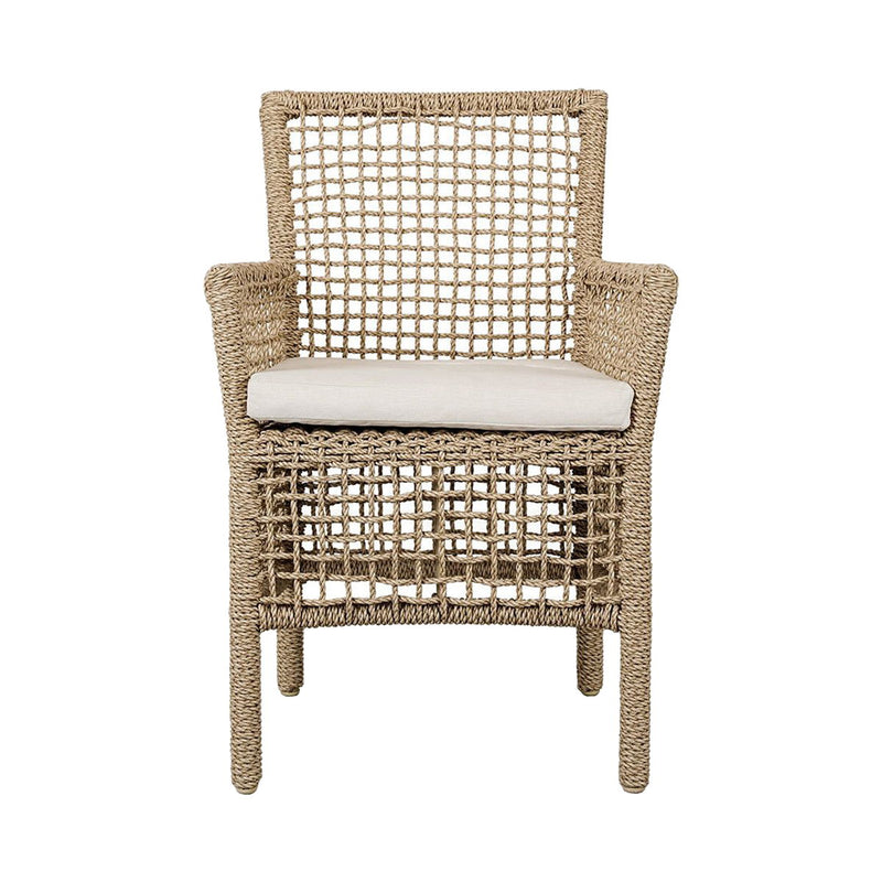 Natural woven outdoor dining chair with white seat cushion and open lattice front
