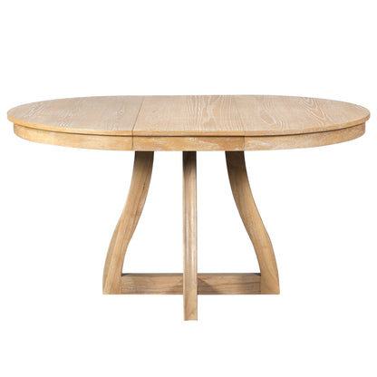 Light brown round dining table with extendable middle leaf and curved pedestal legs