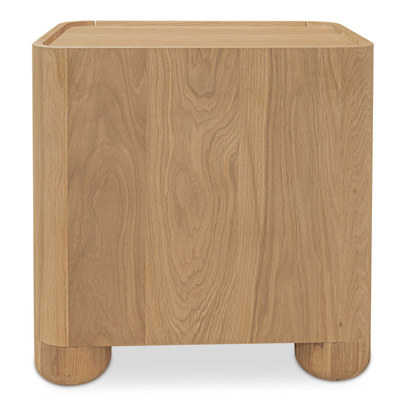 Light brown wood nightstand shown from the back, with a raised-edge top and rounded feet.