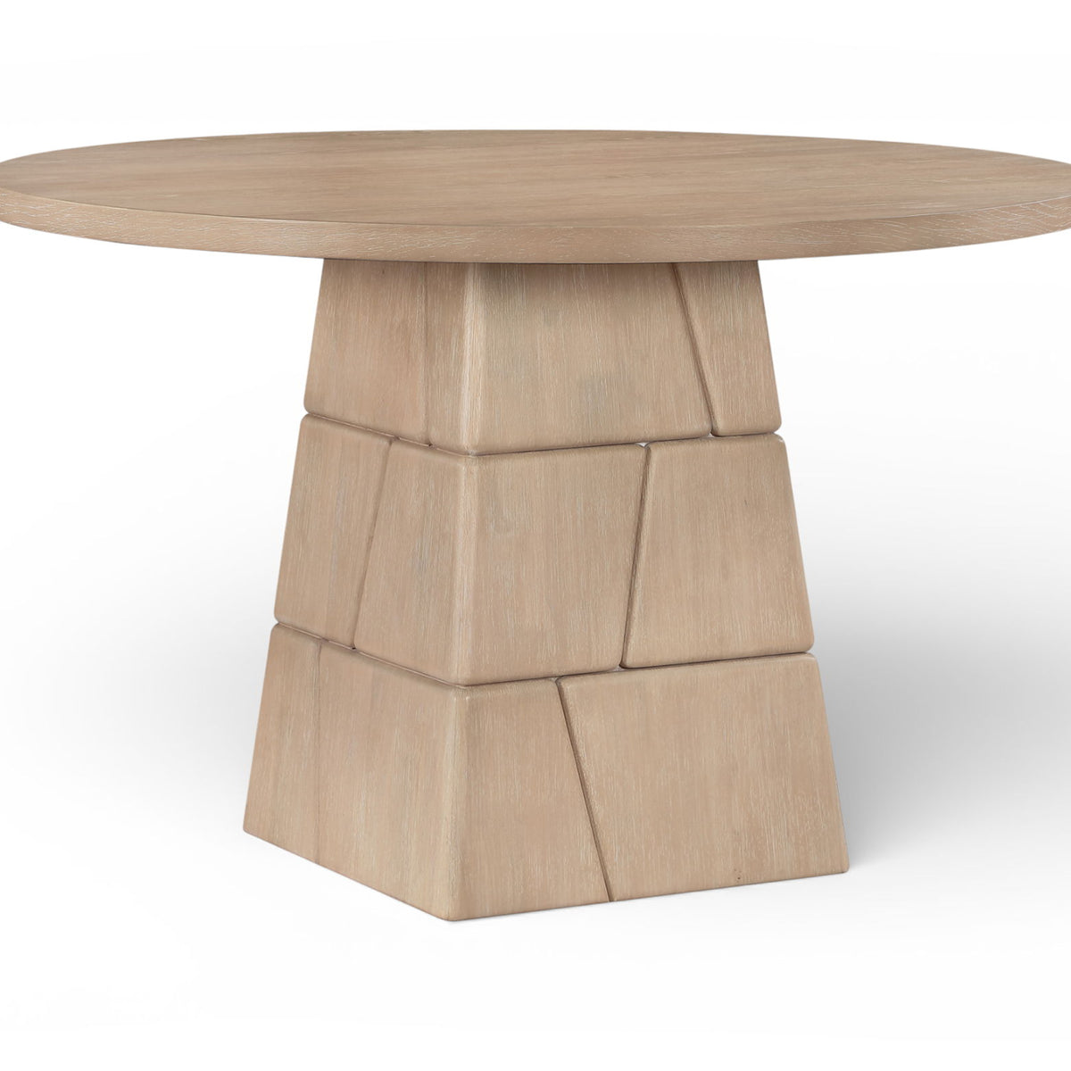 Light brown round dining table with stacked block pedestal base and smooth round top