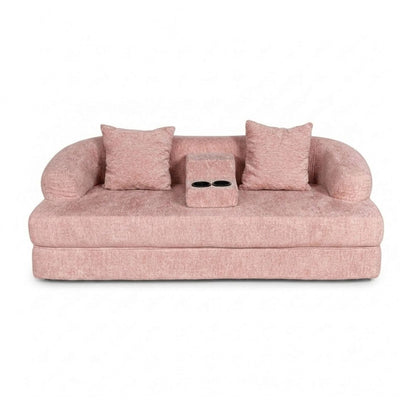 Pink convertible sleeper sofa bed with two armrests and two cup holders