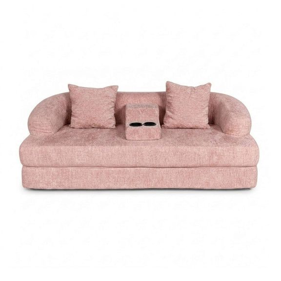 Pink convertible sleeper sofa bed with two armrests and two cup holders