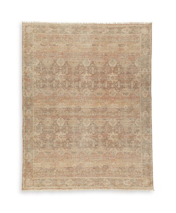 Light brown rectangular rug with distressed ornate pattern