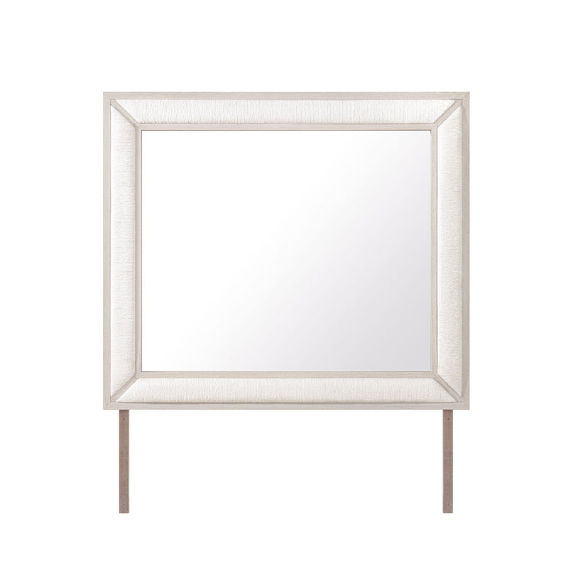 Beige rectangular wall mirror with textured frame border and thin legs