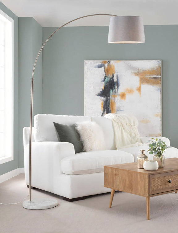 Gray fabric shade contemporary floor lamp with arched metal stem and round stone base