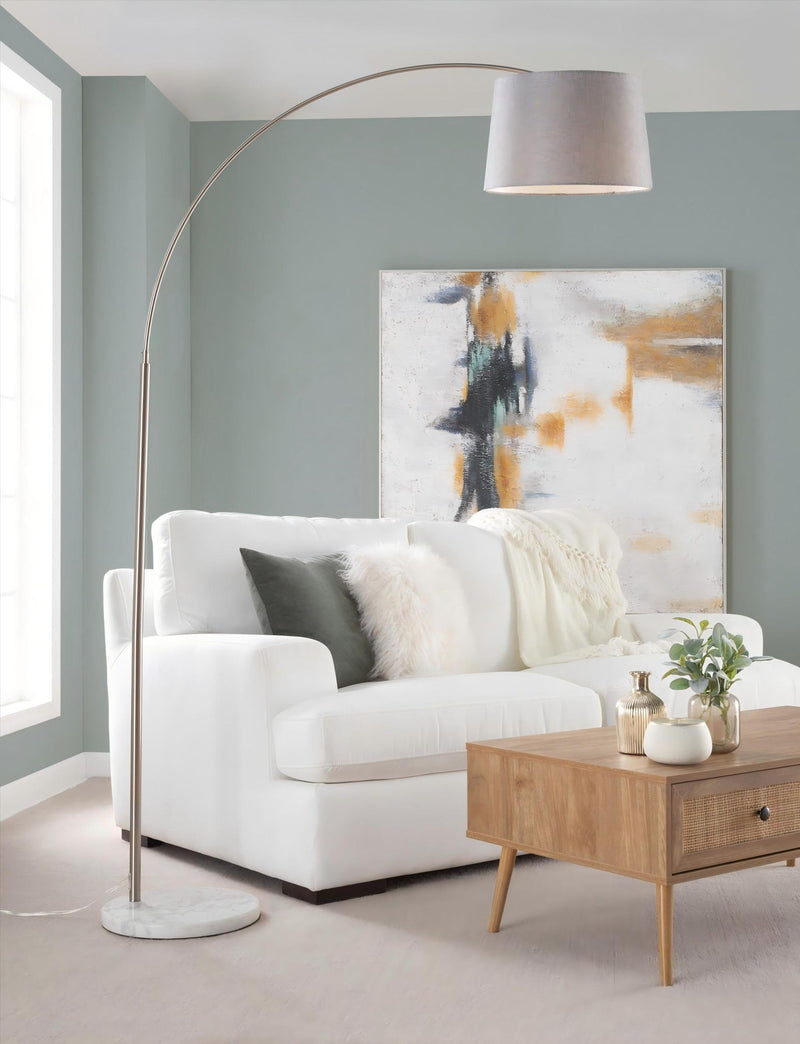 Gray fabric shade contemporary floor lamp with arched metal stem and round stone base