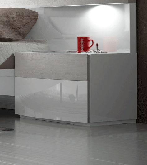 White nightstand with open center shelf and two drawer fronts.