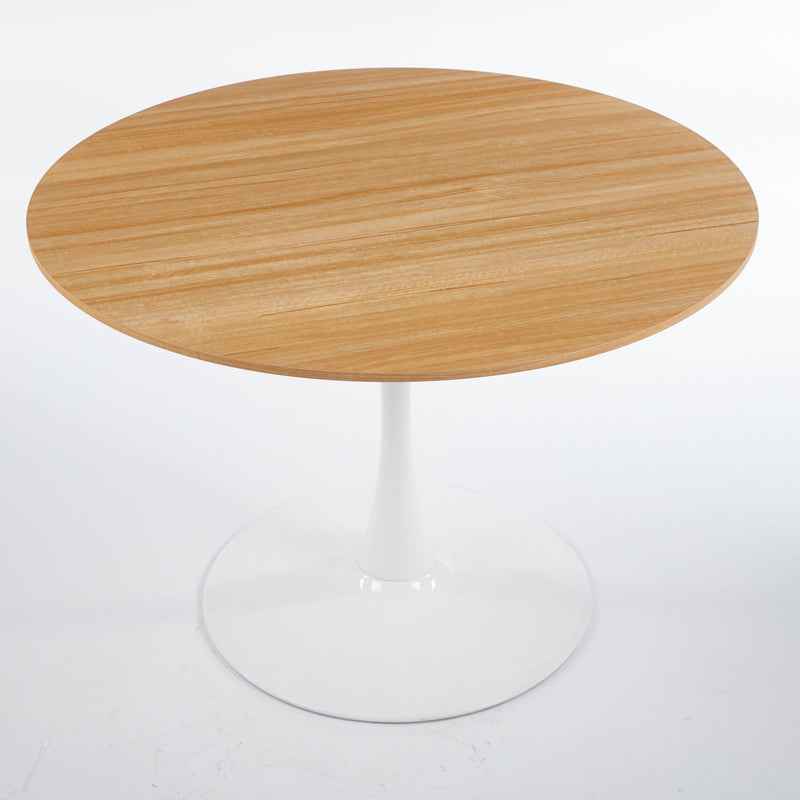 Round tulip-base dining table with light wood tabletop and white pedestal base
